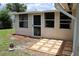 Tan sunroom with stone patio at 6702 71St N Ave, Pinellas Park, FL 33781