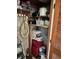Storage closet with shelving and various items at 24 Quails Run Blvd # 3, Englewood, FL 34223