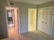 Bedroom with access to another room and a closet at 24 Quails Run Blvd # 3, Englewood, FL 34223