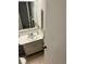Bathroom with vanity, sink, and medicine cabinet at 24 Quails Run Blvd # 3, Englewood, FL 34223
