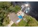 Property overview showcasing home, dock, and waterfront location at 1422 Bayshore Rd, Ruskin, FL 33570