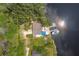 Overhead view of house and dock on the water at 1422 Bayshore Rd, Ruskin, FL 33570