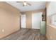 Spacious bedroom with double door closet and wood-look floors at 272 E Tarpon Nw Blvd, Port Charlotte, FL 33952