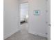 Bright hallway with view of bedroom at 5330 Silver Sun Dr, Apollo Beach, FL 33572