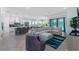 Open floor plan boasting a spacious kitchen, large island, and Gathering room with ample natural light at 5330 Silver Sun Dr, Apollo Beach, FL 33572
