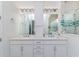 Bathroom with double vanity and walk-in shower at 5330 Silver Sun Dr, Apollo Beach, FL 33572