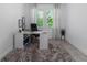 Home office with large desk and window views at 5330 Silver Sun Dr, Apollo Beach, FL 33572