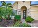 Inviting house exterior with stone accents and lush landscaping at 5330 Silver Sun Dr, Apollo Beach, FL 33572