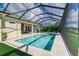 Screened pool and spa with lake views at 5330 Silver Sun Dr, Apollo Beach, FL 33572