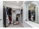 Large walk-in closet with ample shelving and hanging space at 5330 Silver Sun Dr, Apollo Beach, FL 33572