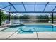 Inviting pool area with spa and tranquil lake views at 5330 Silver Sun Dr, Apollo Beach, FL 33572