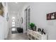 Spacious entryway with tile flooring and decorative console table at 5330 Silver Sun Dr, Apollo Beach, FL 33572