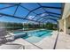 Screened pool and spa with lake views at 5330 Silver Sun Dr, Apollo Beach, FL 33572