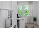Bright home office with built-in desk and window views at 5330 Silver Sun Dr, Apollo Beach, FL 33572