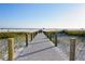 Wooden boardwalk leading to Siesta Beach at 1505 31St St, Sarasota, FL 34234