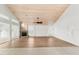 Living room with vaulted ceiling, fireplace and hardwood floors at 13065 Via Aurelia, Placida, FL 33946
