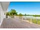 Large composite deck overlooking the water with white railing at 13065 Via Aurelia, Placida, FL 33946