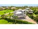 Aerial view of the property showcasing the house and surrounding landscape at 13065 Via Aurelia, Placida, FL 33946