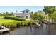 Two-story house with waterfront access and private dock at 13065 Via Aurelia, Placida, FL 33946