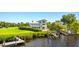 Modern two-story home, private dock, lush landscaping at 13065 Via Aurelia, Placida, FL 33946