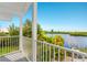 Private balcony offering scenic water and landscape views at 13065 Via Aurelia, Placida, FL 33946