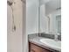 Bathroom with shower and granite countertop at 12730 Lemon Pepper Dr, Riverview, FL 33578
