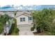 Two-story house, aerial view of front at 12730 Lemon Pepper Dr, Riverview, FL 33578