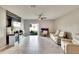 Bright and spacious Gathering room with tiled floors and a large TV at 12730 Lemon Pepper Dr, Riverview, FL 33578