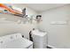 Laundry room with washer, dryer, and shelving at 12730 Lemon Pepper Dr, Riverview, FL 33578