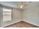 Bright bedroom with a window and ceiling fan at 12730 Lemon Pepper Dr, Riverview, FL 33578