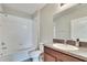 Clean bathroom with tub, toilet, and single vanity at 12730 Lemon Pepper Dr, Riverview, FL 33578