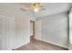 Bedroom with double door closet and access to another room at 12730 Lemon Pepper Dr, Riverview, FL 33578