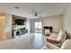 Gathering room with fireplace and access to the backyard at 12730 Lemon Pepper Dr, Riverview, FL 33578