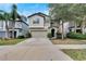 Two-story house with attached garage at 12730 Lemon Pepper Dr, Riverview, FL 33578