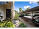 Exterior view of building entrance and carport at 4837 Puritan Cir # 2505, Tampa, FL 33617