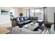 Spacious living room with comfortable sectional sofa and large windows at 4837 Puritan Cir # 2505, Tampa, FL 33617