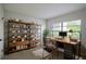 Bright home office features built-in shelving and a workspace at 4837 Puritan Cir # 2505, Tampa, FL 33617
