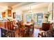 Charming dining room with wood table and hardwood floors at 1479 S Evergreen Ave, Clearwater, FL 33756