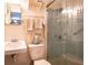Small bathroom with shower, toilet and sink at 1479 S Evergreen Ave, Clearwater, FL 33756