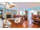 Spacious living room with hardwood floors and fireplace at 1479 S Evergreen Ave, Clearwater, FL 33756