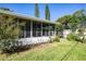 Relaxing backyard patio with seating area at 1479 S Evergreen Ave, Clearwater, FL 33756