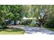 Charming single-story home with a circular driveway at 1479 S Evergreen Ave, Clearwater, FL 33756