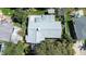 Directly above view of a home's gray roof and surrounding trees at 1479 S Evergreen Ave, Clearwater, FL 33756