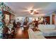 Large living room with hardwood floors, fireplace, and ample seating at 1479 S Evergreen Ave, Clearwater, FL 33756