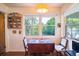 Small kitchen with drop leaf table and chairs, spice rack at 1479 S Evergreen Ave, Clearwater, FL 33756