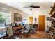 Home office with rocking chairs, computer and built-in shelves at 1479 S Evergreen Ave, Clearwater, FL 33756