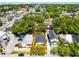 An aerial view highlighting the boundaries of the home's lot amid lush greenery at 2335 W Beach St, Tampa, FL 33607