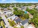 Beautiful aerial view showcasing the home, adjacent properties, and tree-lined street at 2335 W Beach St, Tampa, FL 33607