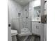 Modern bathroom with marble shower and white vanity at 2335 W Beach St, Tampa, FL 33607