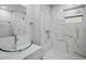 Bright bathroom featuring modern fixtures, sleek tile, and a stylish vessel sink with glass surround at 2335 W Beach St, Tampa, FL 33607